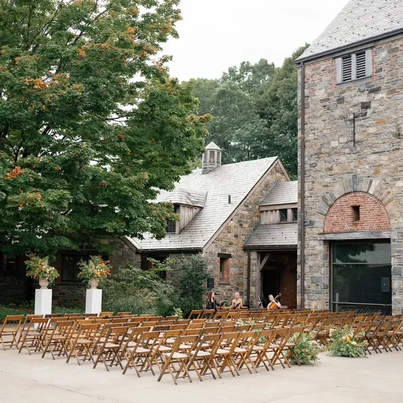 wedding ceremony with tree backdrop